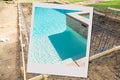 Pool Construction Site with Picture Photo Frame Containing Finished Project Royalty Free Stock Photo