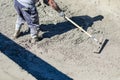 Pool Construction Worker Working With A Bullfloat On Wet Concrete Royalty Free Stock Photo