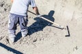 Pool Construction Worker Working With A Bullfloat On Wet Concrete Royalty Free Stock Photo