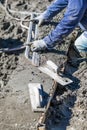 Pool Construction Worker Working With A Smoother Rod On Wet Concrete Royalty Free Stock Photo