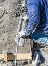 Pool Construction Worker Working With A Smoother Rod On Wet Concrete Royalty Free Stock Photo