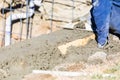 Pool Construction Worker Working With Wood Float On Wet Concrete Royalty Free Stock Photo