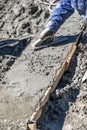 Pool Construction Worker Working With Wood Float On Wet Concrete Royalty Free Stock Photo