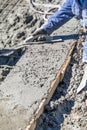 Pool Construction Worker Working With Wood Float On Wet Concrete Royalty Free Stock Photo