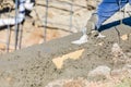 Pool Construction Worker Working With Wood Float On Wet Concrete Royalty Free Stock Photo