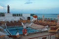 Pool on deck of cruise liner in evening Royalty Free Stock Photo