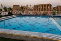 Pool deck and parasols of luxury boat cruise ship in egypt luxor during dawn sunset