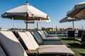 Pool deck and parasols of luxury boat cruise ship in egypt luxor during dawn sunset Royalty Free Stock Photo