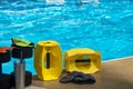 Pool exercise aquatic aerobics equipment by the side of the water