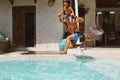 Pool. Father And Son Jumping In Water From Poolside. Little Boy And Dad Having Fun. Royalty Free Stock Photo