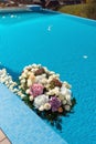 The pool filled with white rose flowers. Wedding decor. Royalty Free Stock Photo