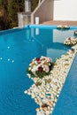 The pool filled with white rose flowers. Wedding decor. Royalty Free Stock Photo