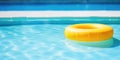 Pool Float In A Swimming Pool A Yellow Pool Float Ring Floating In A Refreshing Blue Swimming Pool Royalty Free Stock Photo