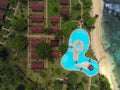 A pool in heart shape and bungalows at Ilheu das Rolas island ,Sao Tome e Principe