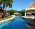 Pool landscape at a Caribbean tropical resort. Royalty Free Stock Photo