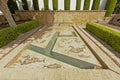 Pool with mosaic of fishes and mythical sea creatures in the Alcazar of Cordoba Royalty Free Stock Photo