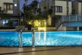 Pool at night in resort holiday getaway. Royalty Free Stock Photo