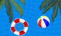 Pool with palm trees and a life buoy beach ball Royalty Free Stock Photo