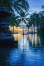 Pool and poolside bangalow at seaside resort and hotel Royalty Free Stock Photo