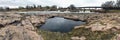 Pool reflection of the sky with the Big Sioux River in Sioux Falls South Dakota with views of wildlife, ruins, park paths, train t Royalty Free Stock Photo