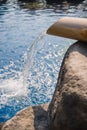 Pool spa still life with bamboo fountain and zen stone Royalty Free Stock Photo