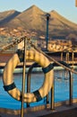 Pool at sunrise with mountains in background, Palermo, Sicily