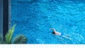 Pool top view angle which young man swimming Royalty Free Stock Photo