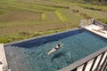 Blue infinity Pool right  in the vineyards in Etna Sicily Italy Royalty Free Stock Photo