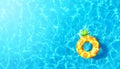 Pool water texture background with inflatable pineapple toy. Top view. Royalty Free Stock Photo