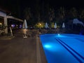 Pool and waterfall at night Royalty Free Stock Photo