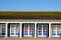 A Line Of Traditional Wooden Beach Huts With No People