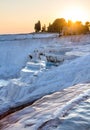 Pools of Pamukkale in Turkey in sunset, contains hot springs and travertines, terraces of carbonate minerals left by water Royalty Free Stock Photo