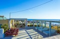 Scenic view of Kamari village coast from poolside deck Santorini Greece