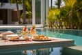 Poolside feast relaxing breakfast in calm water, tropical resort luxury Royalty Free Stock Photo