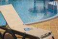 Poolside Lounge Chair With Drink and Tablet Royalty Free Stock Photo