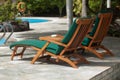 Poolside lounge chairs Royalty Free Stock Photo