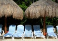 Poolside lounge chairs Royalty Free Stock Photo