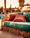 Poolside lounge are with green sofa with oriental arabic or turkish ornaments fringed pillows. Beautiful eastern spa wellness Royalty Free Stock Photo