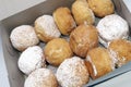 Polish Paczki or PoonchkiÃ¢â¬â¢s, Donuts Dusted With Powdered Sugar and Filled