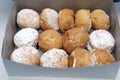 Paczkis, Donuts Dusted With Powdered Sugar and Filled