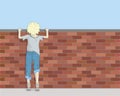 Poor Boy Looking Over Brick Wall Royalty Free Stock Photo