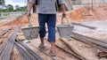 Poor boy working on a construction site. anti child labor Abuse, oppression or coercion, forced child labor Human trafficking. 4K