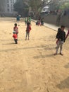 Poor children playing outdoor games