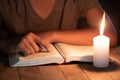 Poor children read books using candles for lighting., Disadvantaged Children doing homework, Education Concept