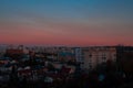 Poor city landmark aerial urban view of Eastern Europe third world country with old buildings apartment in dramatic purple blue