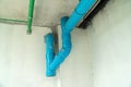 Poor connection of water pipes affects future use. The large blue drain is for draining large amounts of water. blue water pipe Royalty Free Stock Photo