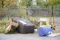 Poor council flats with fly tipping of rubbish outdoors Inverclyde Scotland