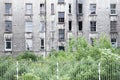 Poor council housing project now abandoned and derelict used by drug users as a squat