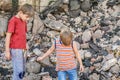 Poor and dirty street children living on an abandoned constructi