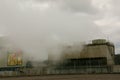 Environmental disaster. Harmful emissions into environment. Smoke and smog. Pollution of atmosphere by factory